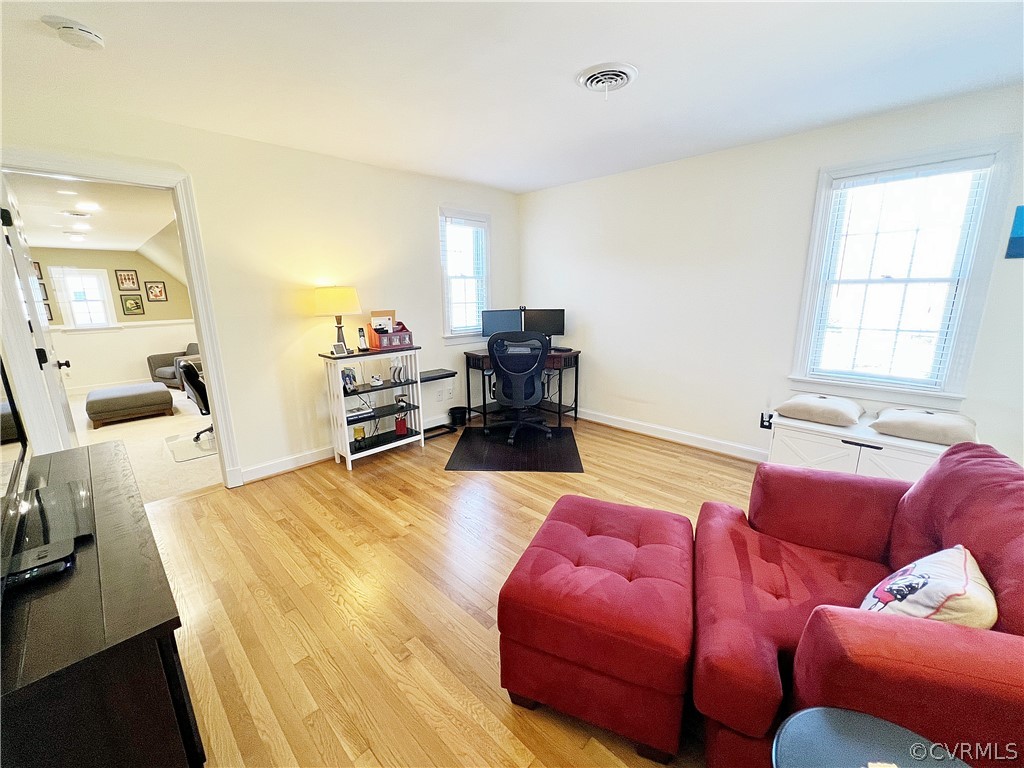 13330 West Salisbury Road Midlothian, VA 23113 - Photo 29 of 50 a living room with furniture and a wooden floor