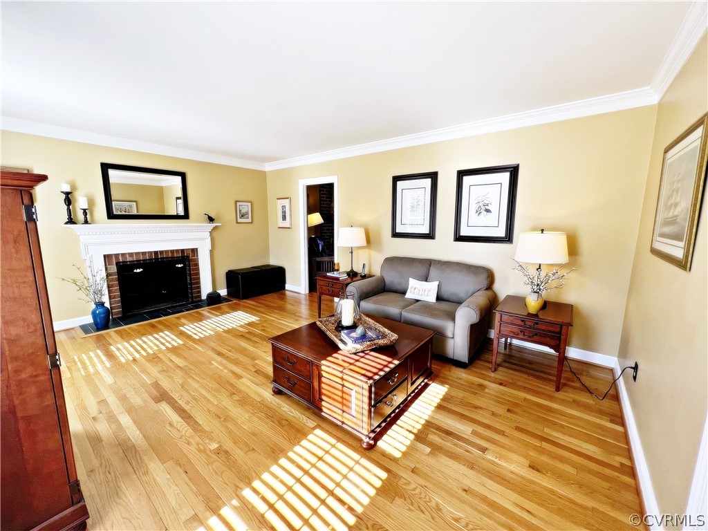 13330 West Salisbury Road Midlothian, VA 23113 - Photo 3 of 50 a living room with furniture and a fireplace
