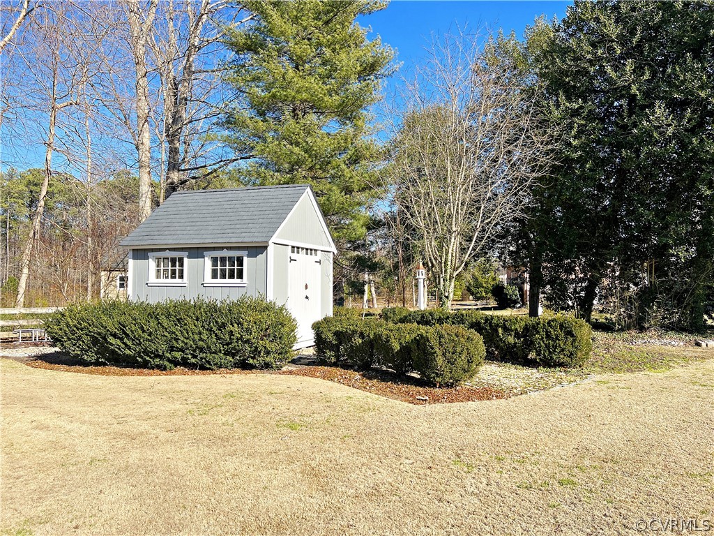 13330 West Salisbury Road Midlothian, VA 23113 - Photo 40 of 50 a front view of a house with a yard