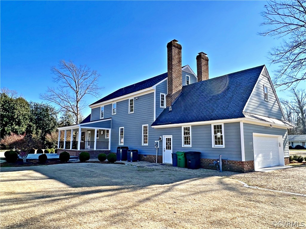 13330 West Salisbury Road Midlothian, VA 23113 - Photo 47 of 50 a front view of a house with a yard
