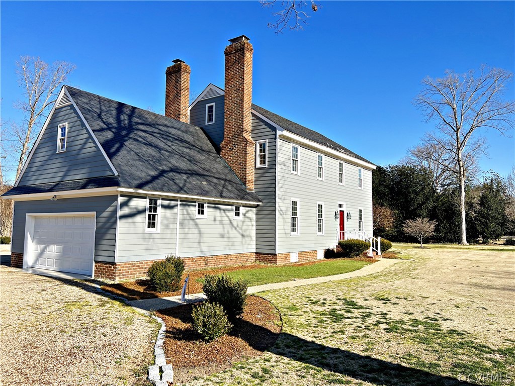 13330 West Salisbury Road Midlothian, VA 23113 - Photo 49 of 50 a front view of a house with a yard