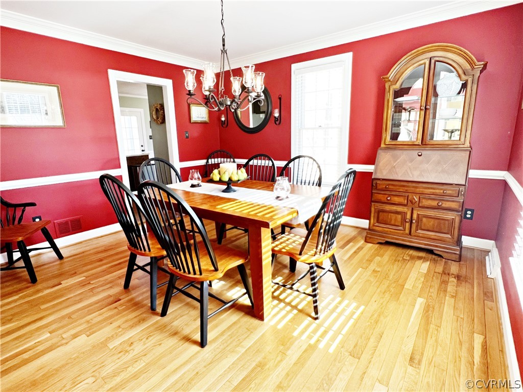 13330 West Salisbury Road Midlothian, VA 23113 - Photo 8 of 50 a view of a dining room with furniture window and wooden floor
