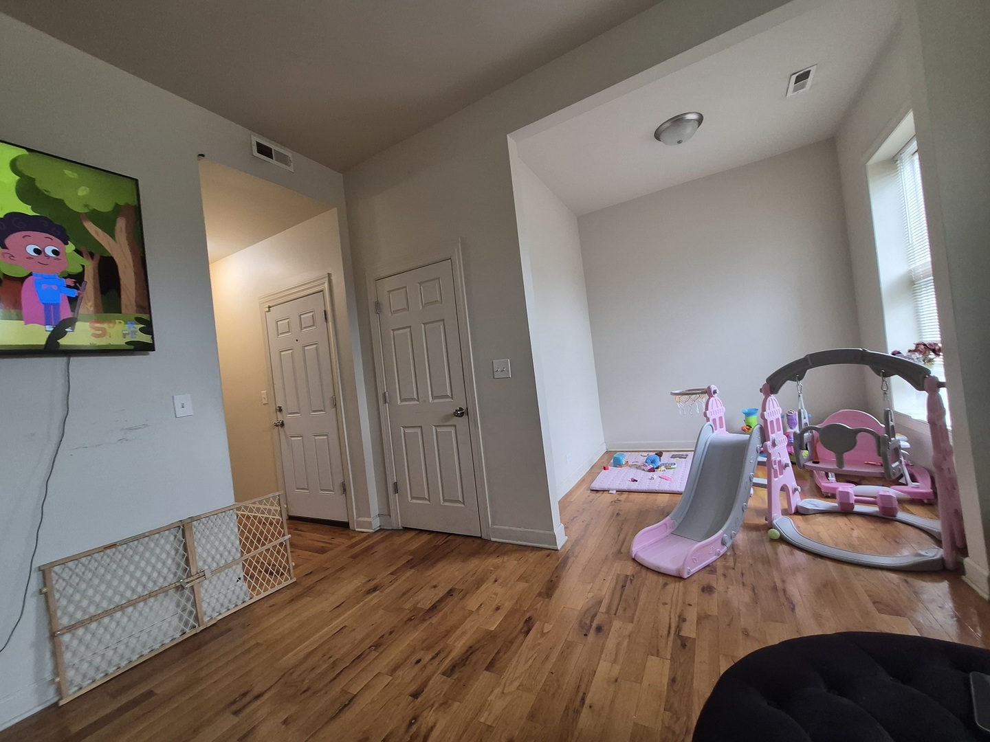 4126 West Adams Street Chicago, IL 60624 - Photo 15 of 19 a view of a dining room with furniture wooden floor and rug