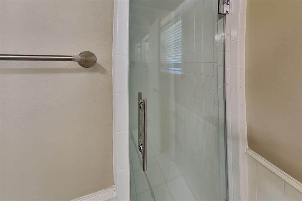 433 Arwine Drive Hurst, TX 76053 - Photo 10 of 18 a bathroom with a shower