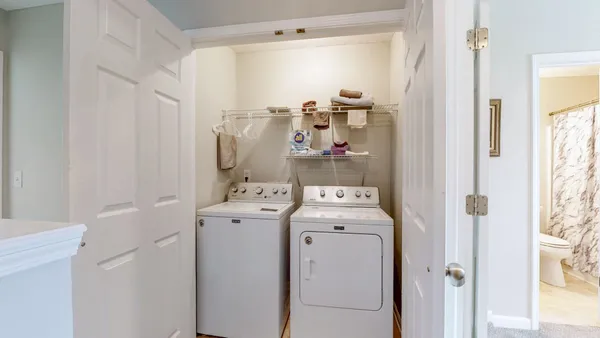 a view of bathroom with washing machine