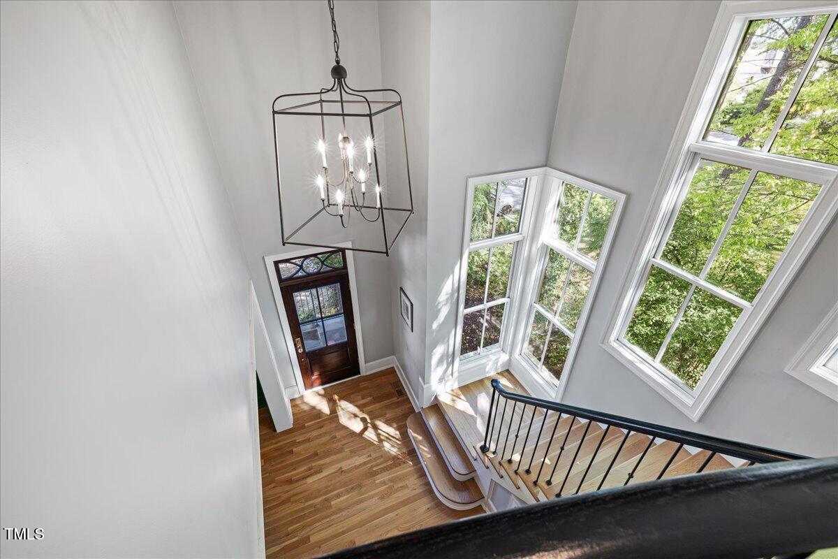 3513 Bellevue Road Raleigh, NC 27609 - Photo 28 of 61 a view of a balcony with wooden floor