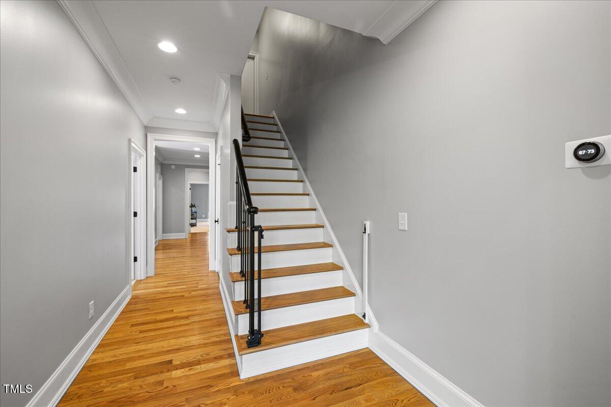 3513 Bellevue Road Raleigh, NC 27609 - Photo 48 of 61 a view of entryway and hall with wooden floor