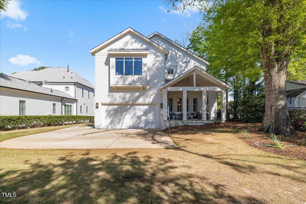 3513 Bellevue Road Raleigh, NC 27609 - Photo 54 of 61 a front view of a house with a yard