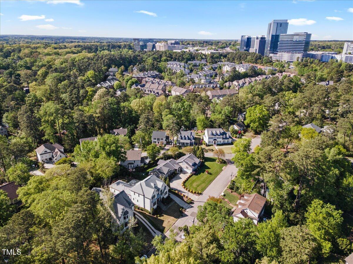 3513 Bellevue Road Raleigh, NC 27609 - Photo 60 of 61 an aerial view of a house with a yard
