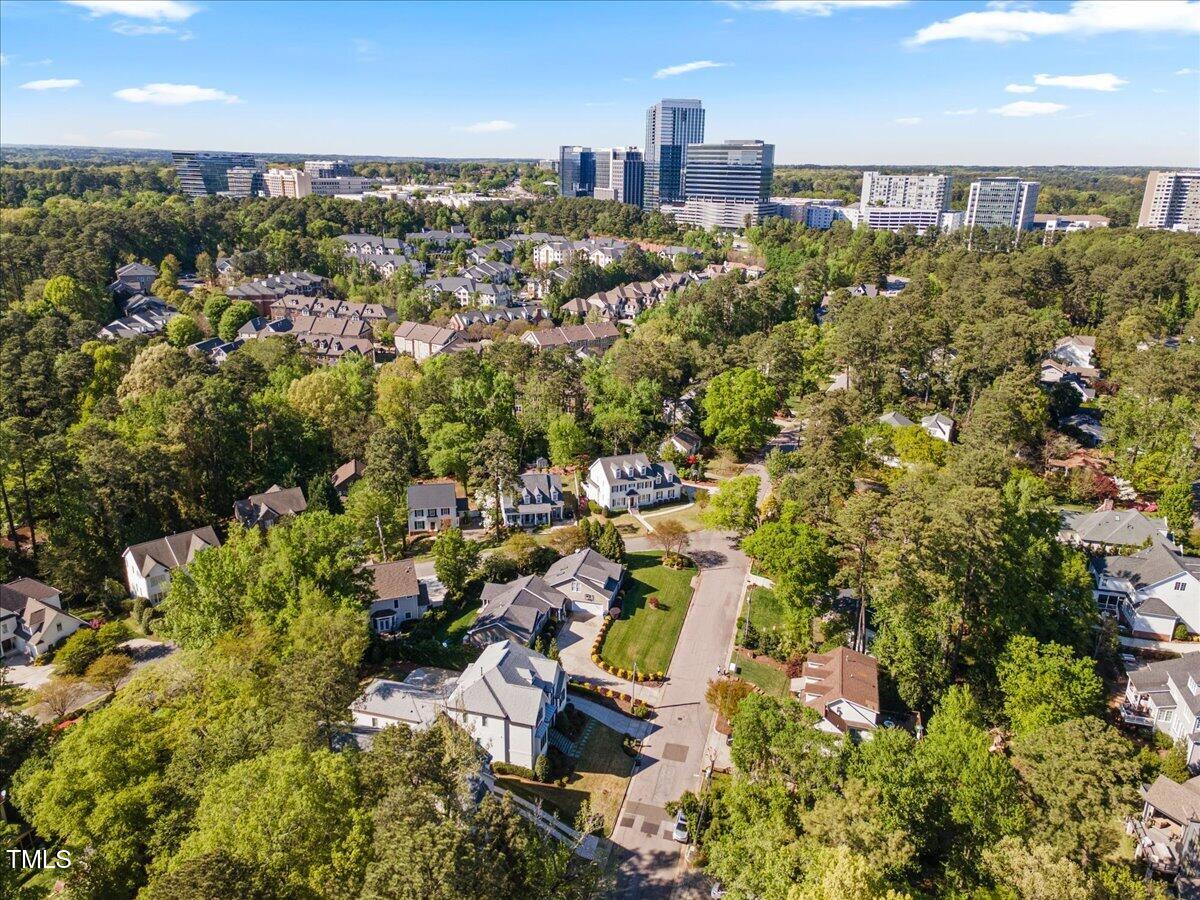 3513 Bellevue Road Raleigh, NC 27609 - Photo 61 of 61 an aerial view of residential house with outdoor space and trees all around