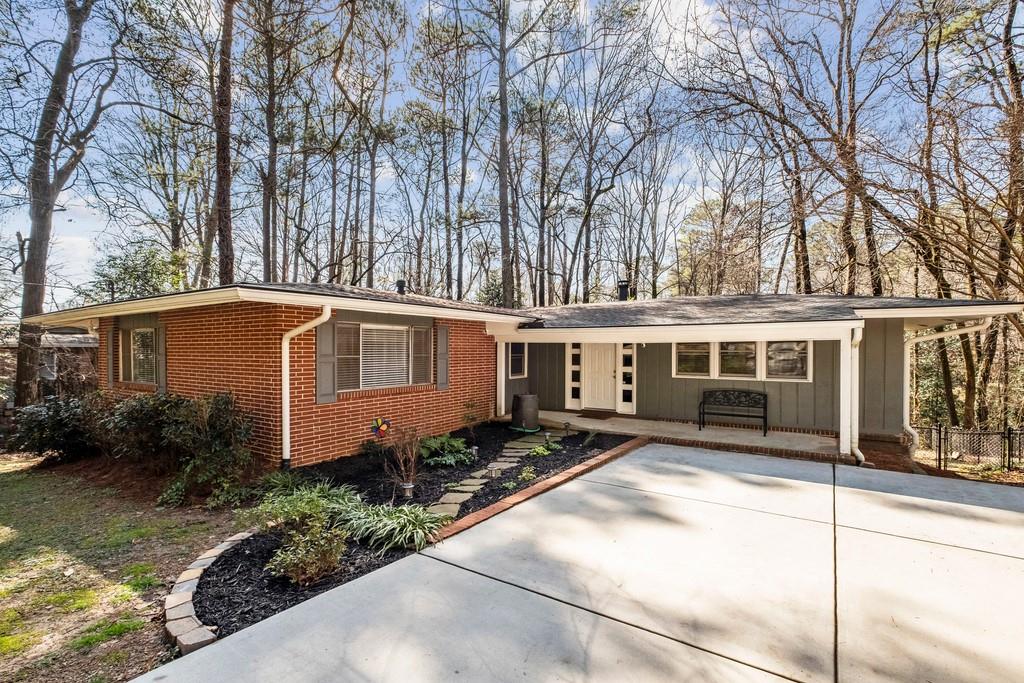 1620 Delia Drive Decatur, GA 30033 - Photo 1 of 1 a front view of a house with garden