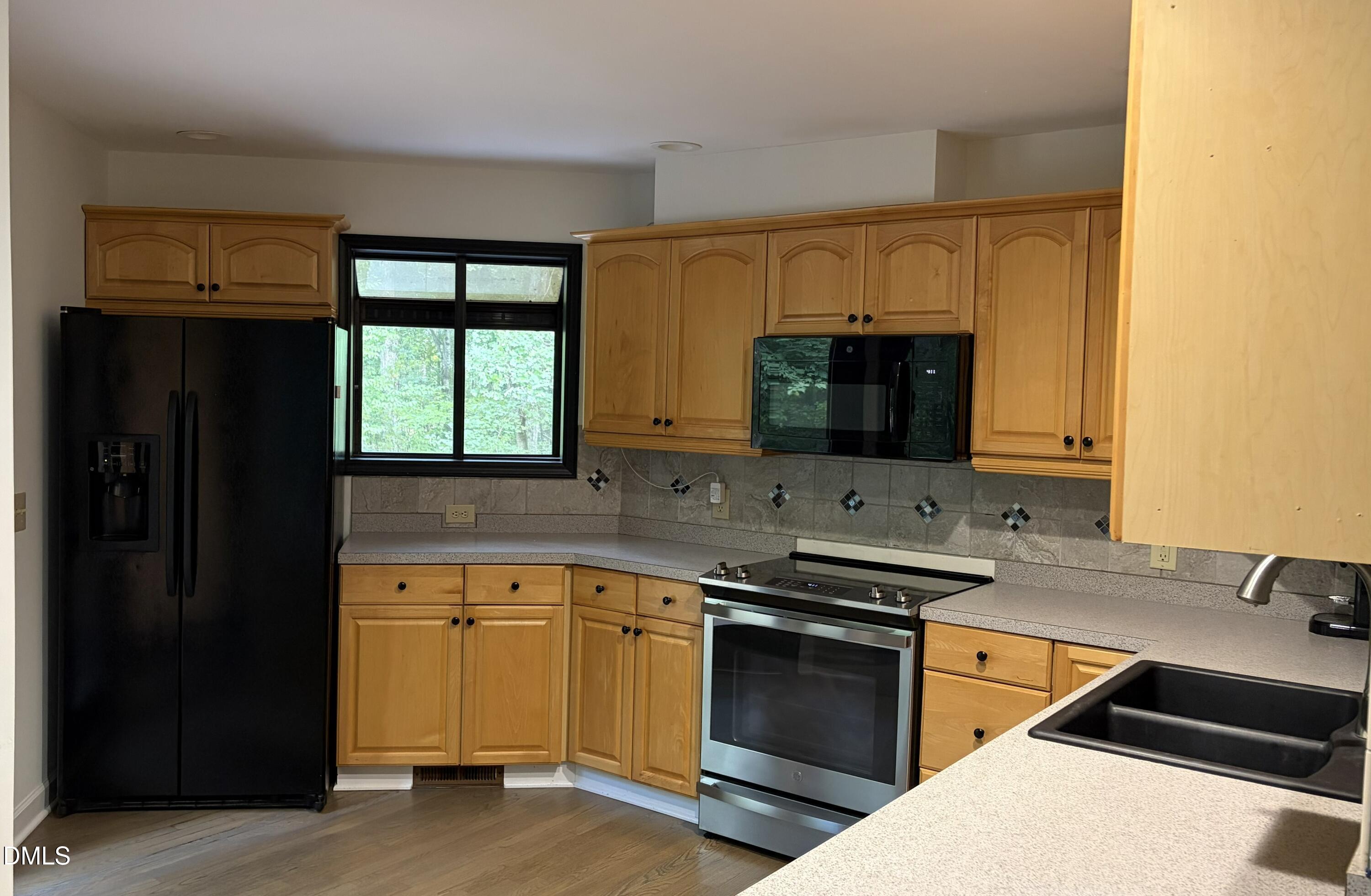 1040 Rolling Knoll Road Apex, NC 27523 - Photo 21 of 40 21-1040 Rolling Knoll Kitchen 1