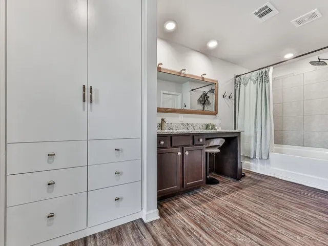 a view of a kitchen with electric appliances