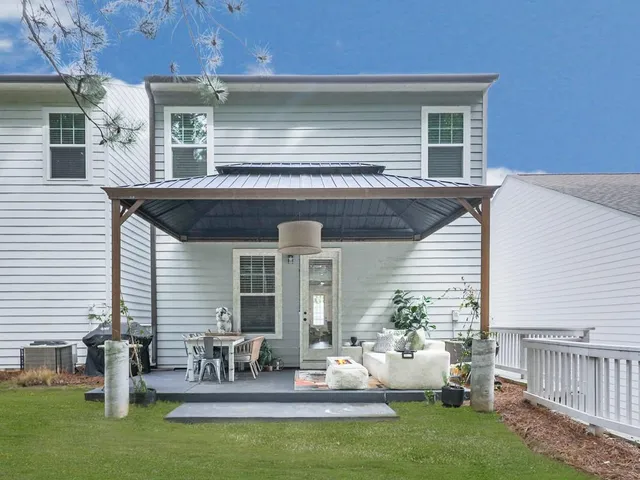 a view of a house with patio