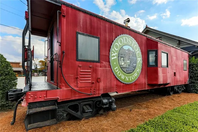 a front view of small pool with seating area