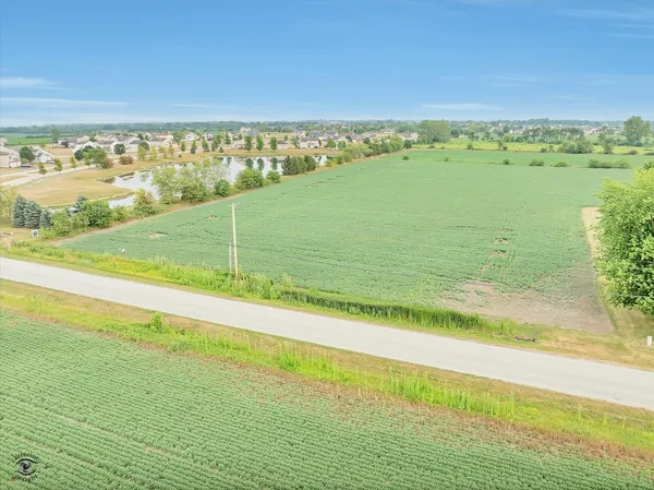 a view of an ocean and a yard
