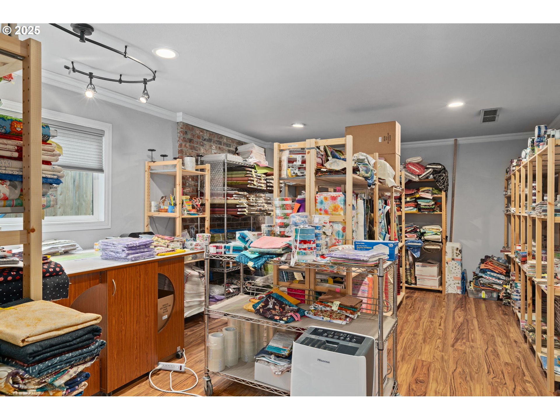 5944 Southwest Wilbard Street Portland, OR 97219 - Photo 13 of 21 a view of a room with lots of wooden furniture