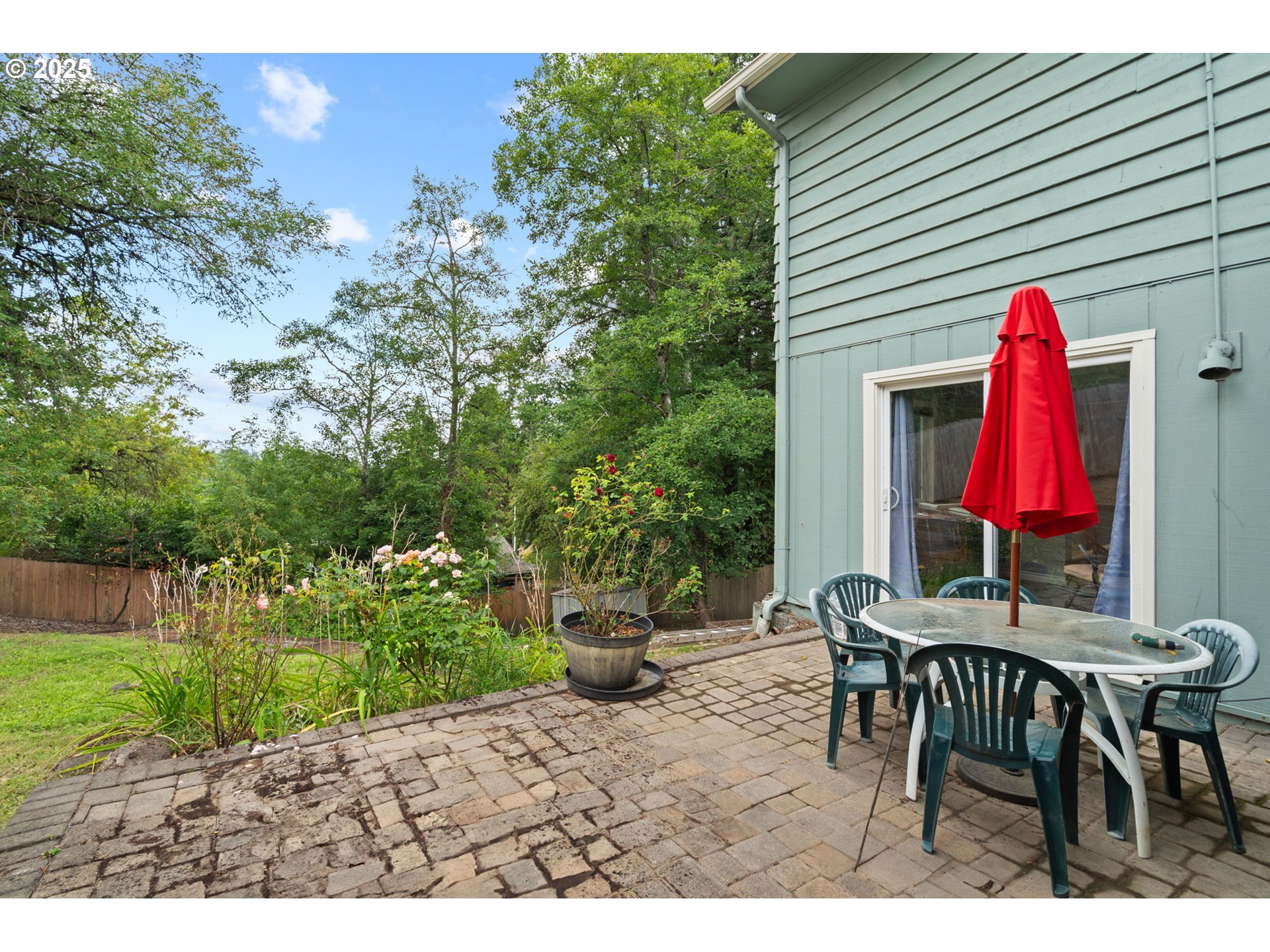 5944 Southwest Wilbard Street Portland, OR 97219 - Photo 18 of 21 a view of a backyard with furniture and a backyard