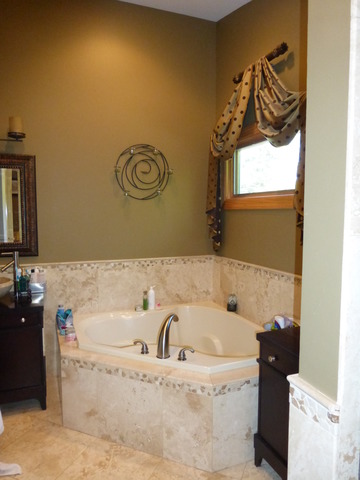 2928 Covert Road Glenview, IL 60025 - Photo 18 of 23 a bathroom with a bathtub and a window