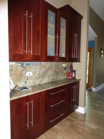 2928 Covert Road Glenview, IL 60025 - Photo 10 of 23 a room with a dresser and wooden cabinets