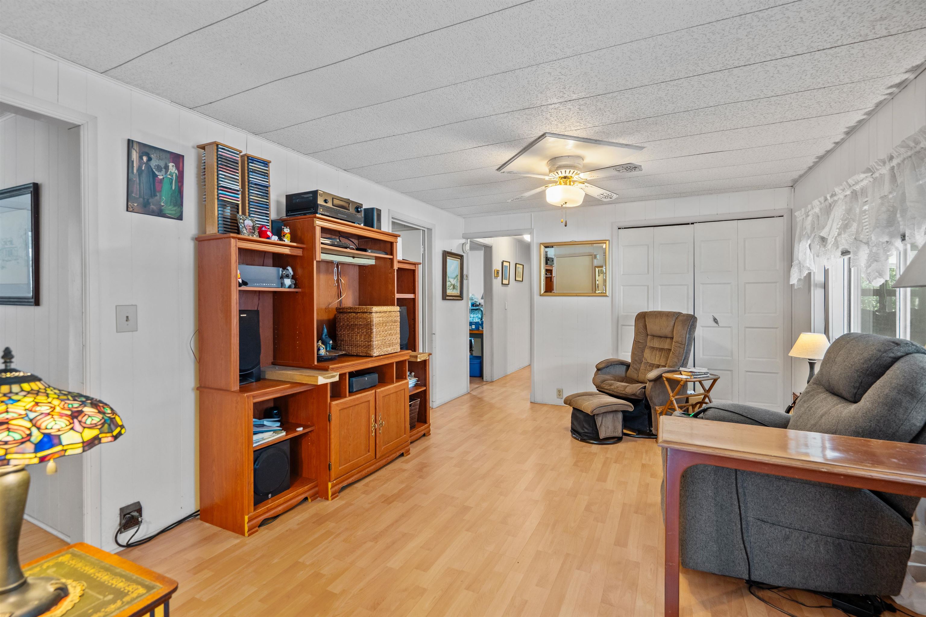 3979 Oak Terrace Road St. Augustine, FL 32086 - Photo 11 of 36 a living room with furniture and a flat screen tv