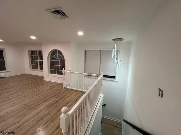 a front view of a house with stairs