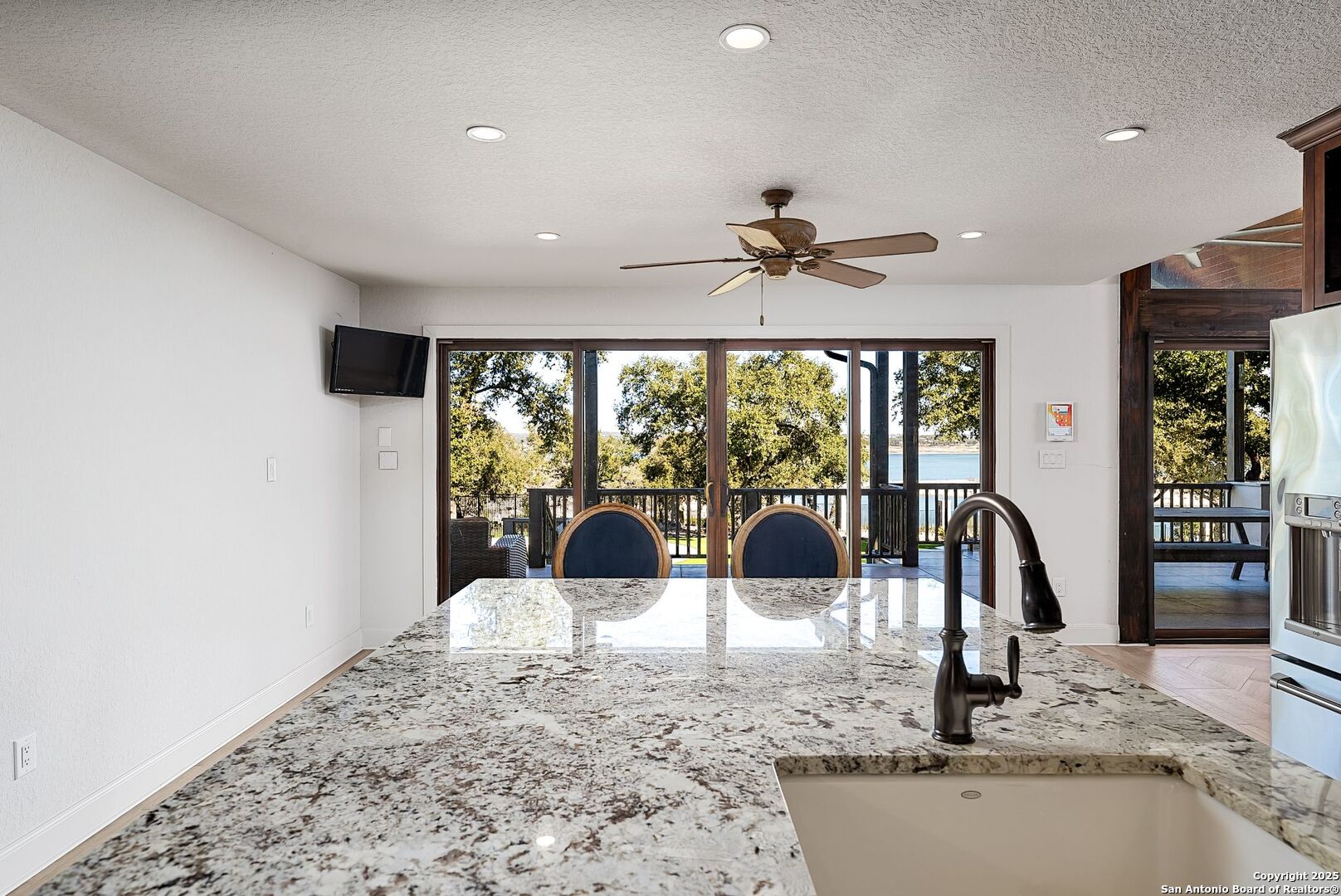 1240 Rip Jay Circle Canyon Lake, TX 78133 - Photo 12 of 52 a view of a kitchen with a large window