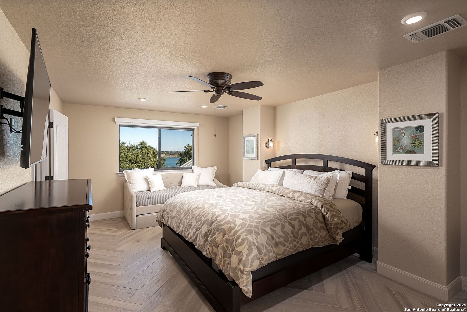 1240 Rip Jay Circle Canyon Lake, TX 78133 - Photo 22 of 52 a bedroom with bed and a window