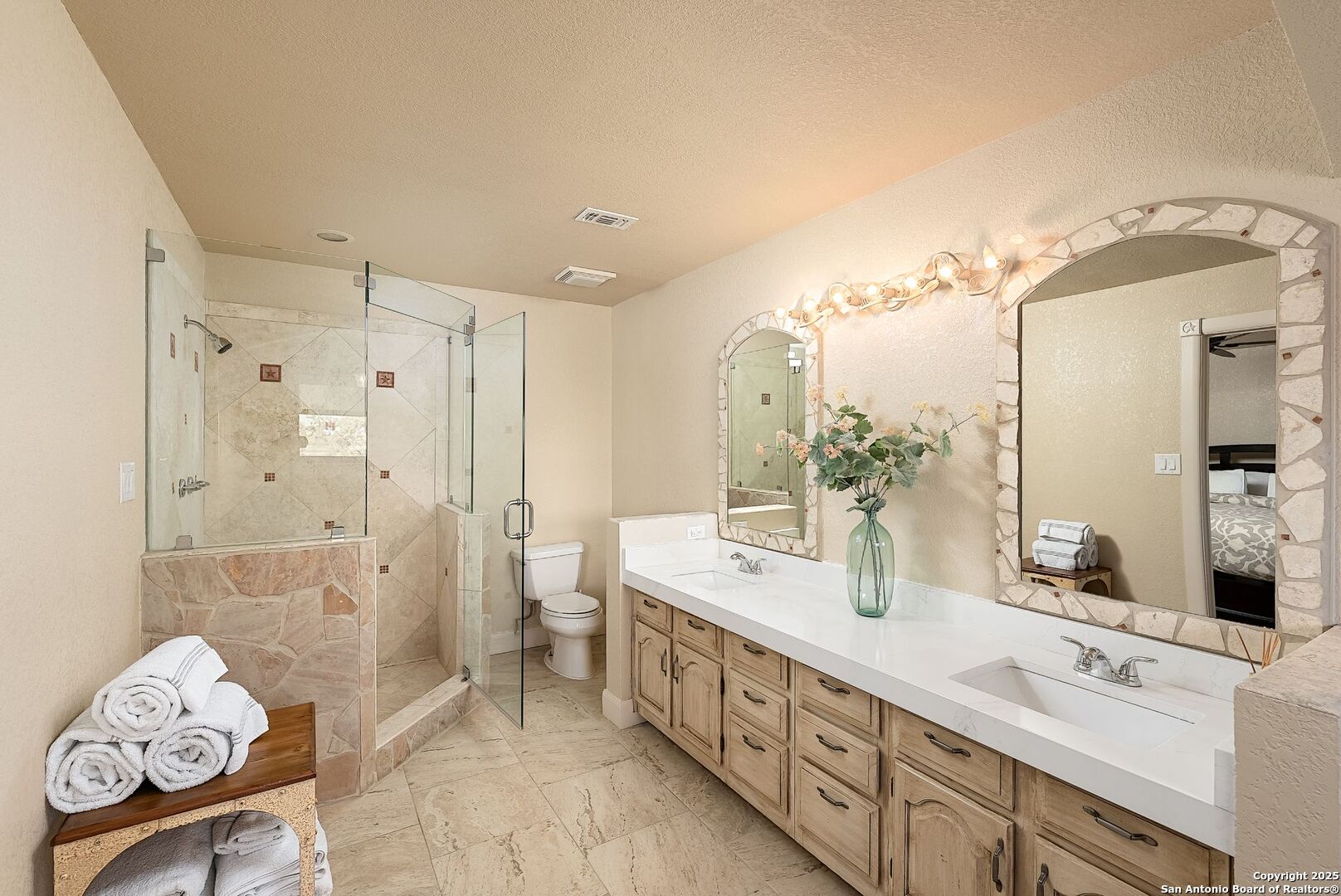 1240 Rip Jay Circle Canyon Lake, TX 78133 - Photo 24 of 52 a spacious bathroom with double vanity and a shower