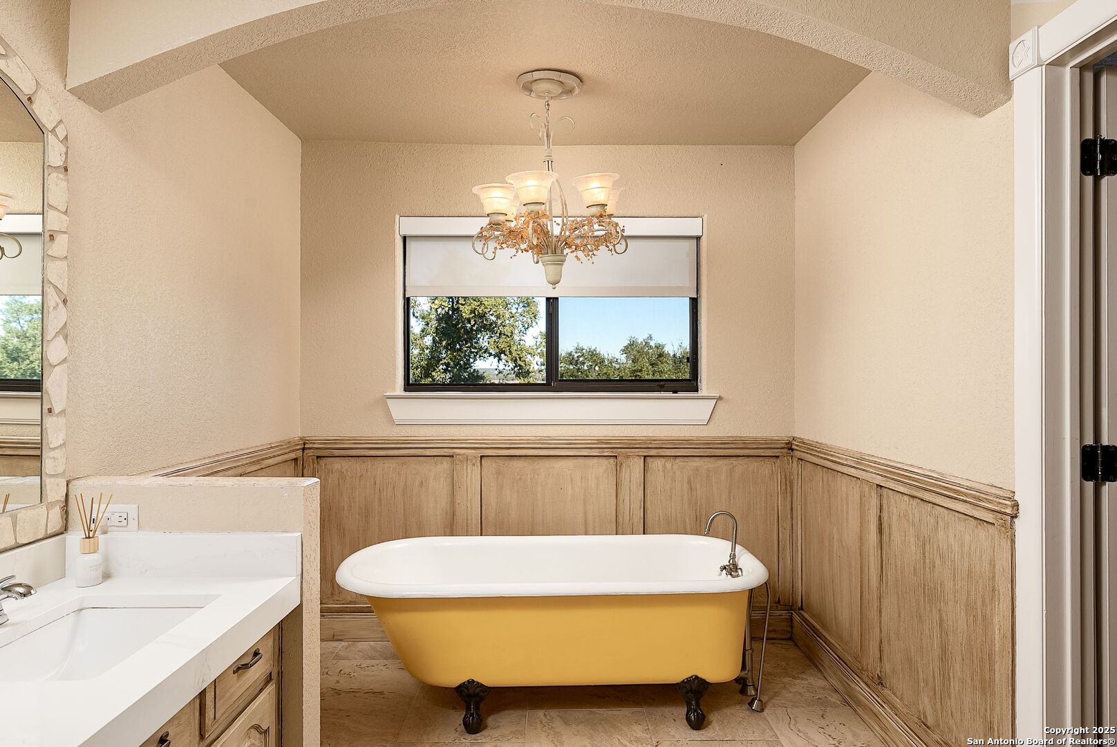 1240 Rip Jay Circle Canyon Lake, TX 78133 - Photo 25 of 52 a bathroom with a sink and a mirror