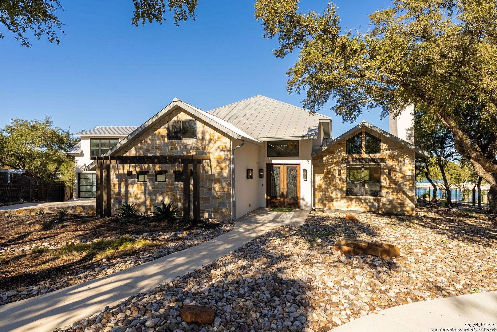 1240 Rip Jay Circle Canyon Lake, TX 78133 - Photo 4 of 52 a front view of a house with a yard