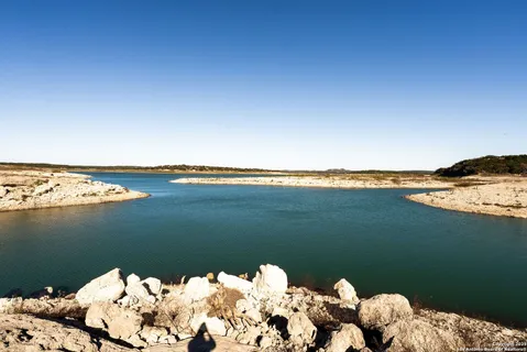 a view of a lake with a mountain in the background