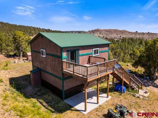 1350 Lion Road Durango, CO 81303 - Photo 1 of 31 a view of a house with a yard