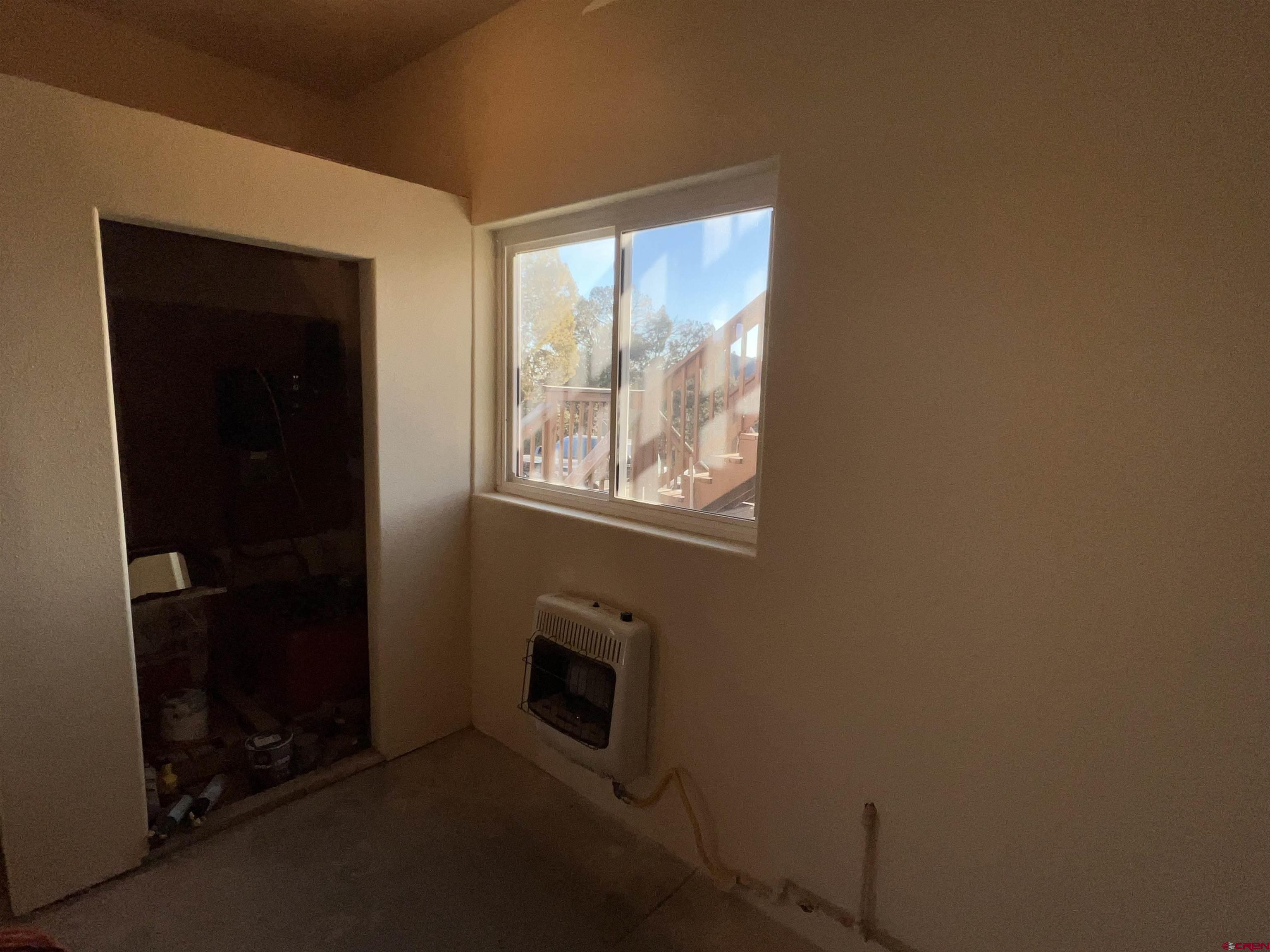 1350 Lion Road Durango, CO 81303 - Photo 24 of 31 an empty room with windows