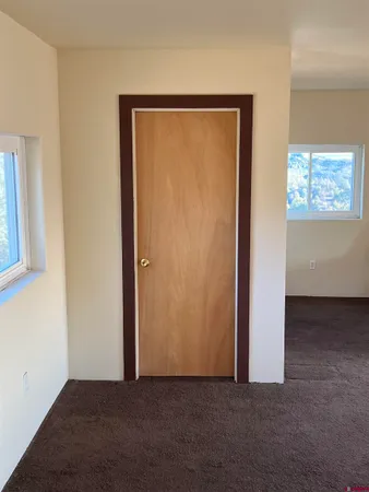 a view of wooden floor and a sink