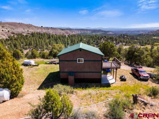 1350 Lion Road Durango, CO 81303 - Photo 3 of 31 a view of a house with a yard