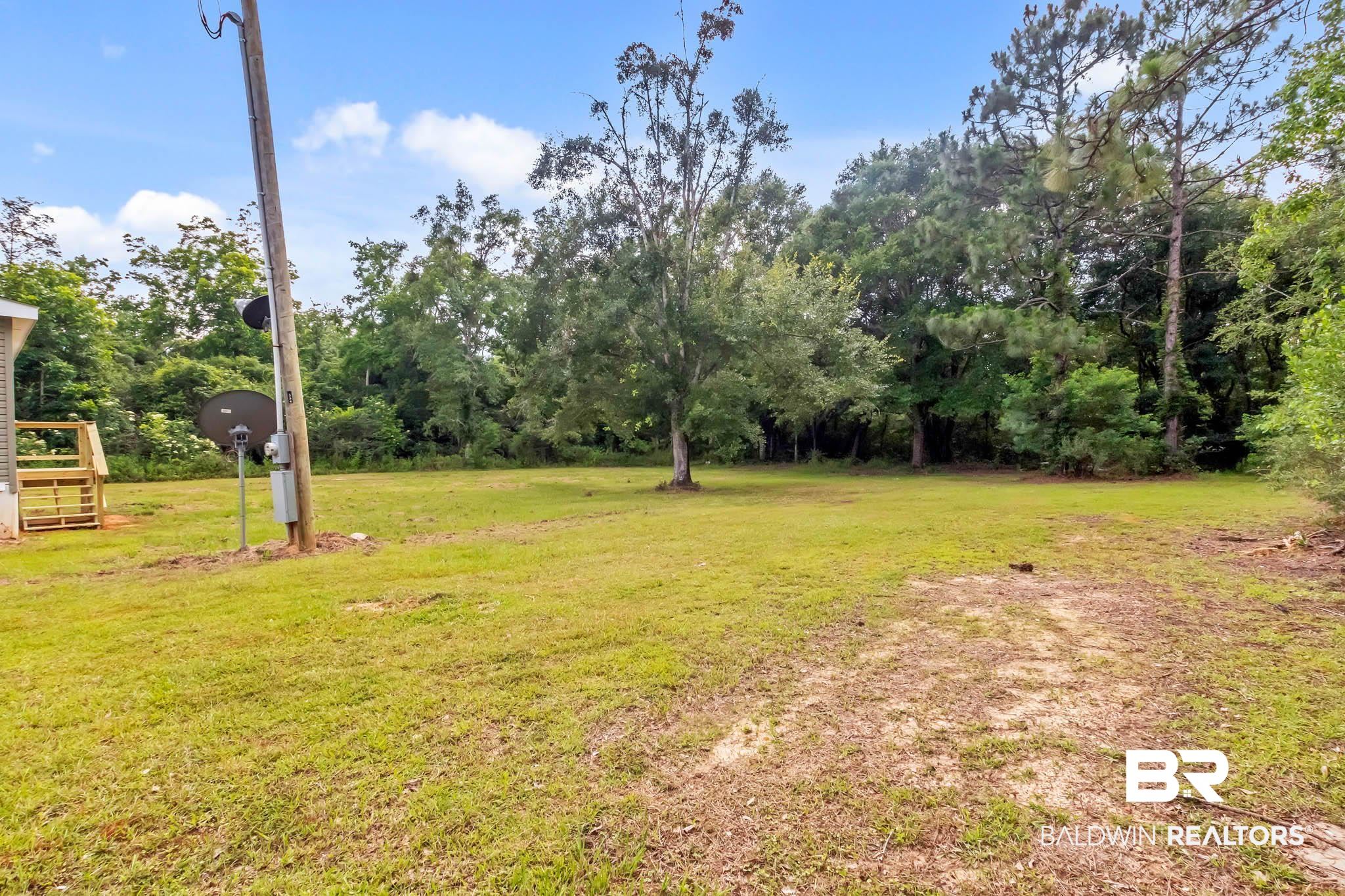 15064 Black Griffin Road Loxley, AL 36551 - Photo 35 of 38 View of grassy yard