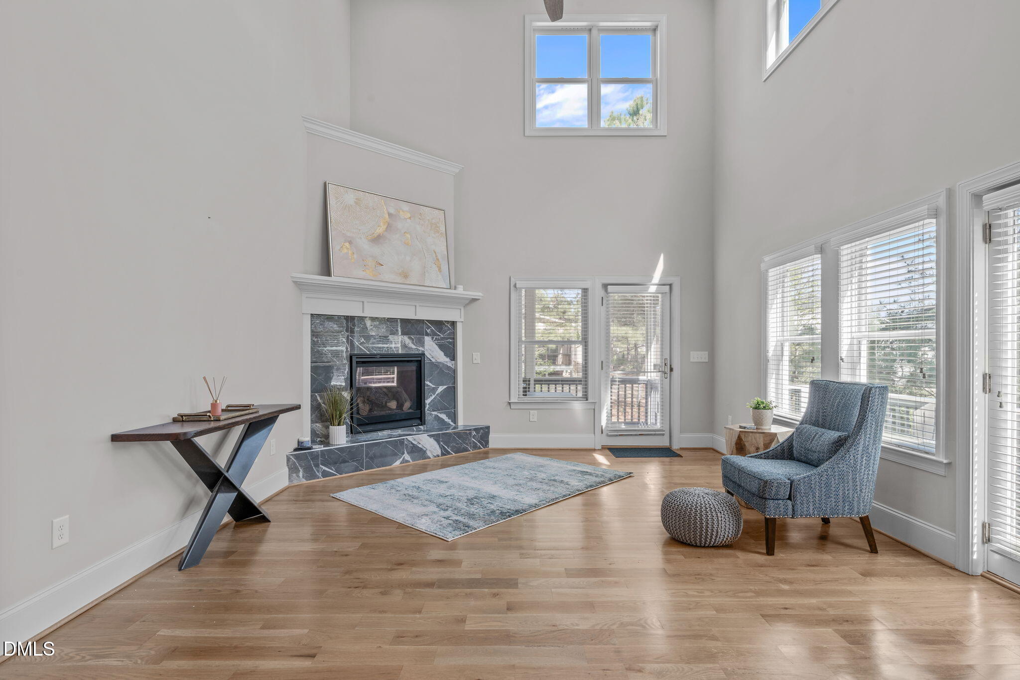 261 Character Drive Rolesville, NC 27571 - Photo 25 of 61 a living room with furniture and a fireplace