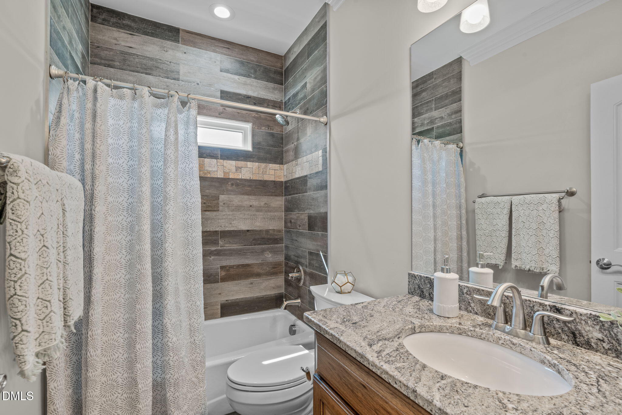 261 Character Drive Rolesville, NC 27571 - Photo 28 of 61 a bathroom with a granite countertop sink toilet and shower