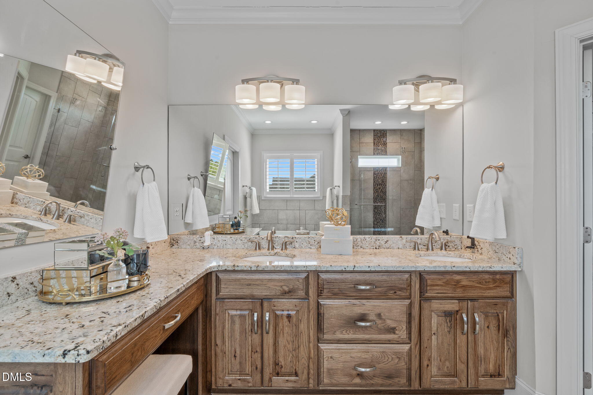 261 Character Drive Rolesville, NC 27571 - Photo 39 of 61 a bathroom with a granite countertop double vanity sink and a mirror