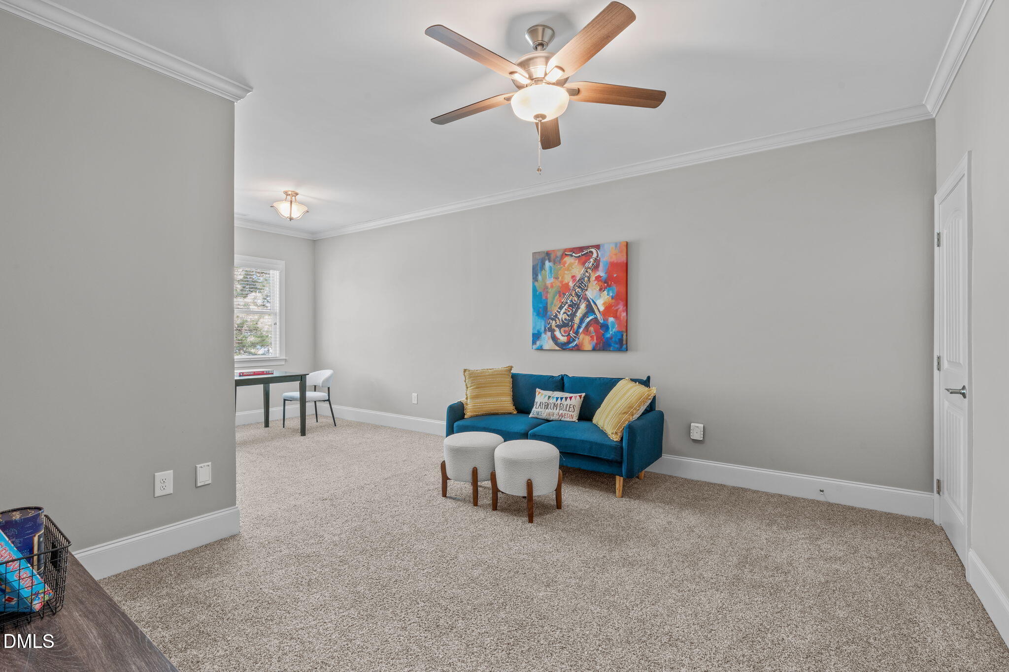 261 Character Drive Rolesville, NC 27571 - Photo 44 of 61 a living room with furniture and a chandelier
