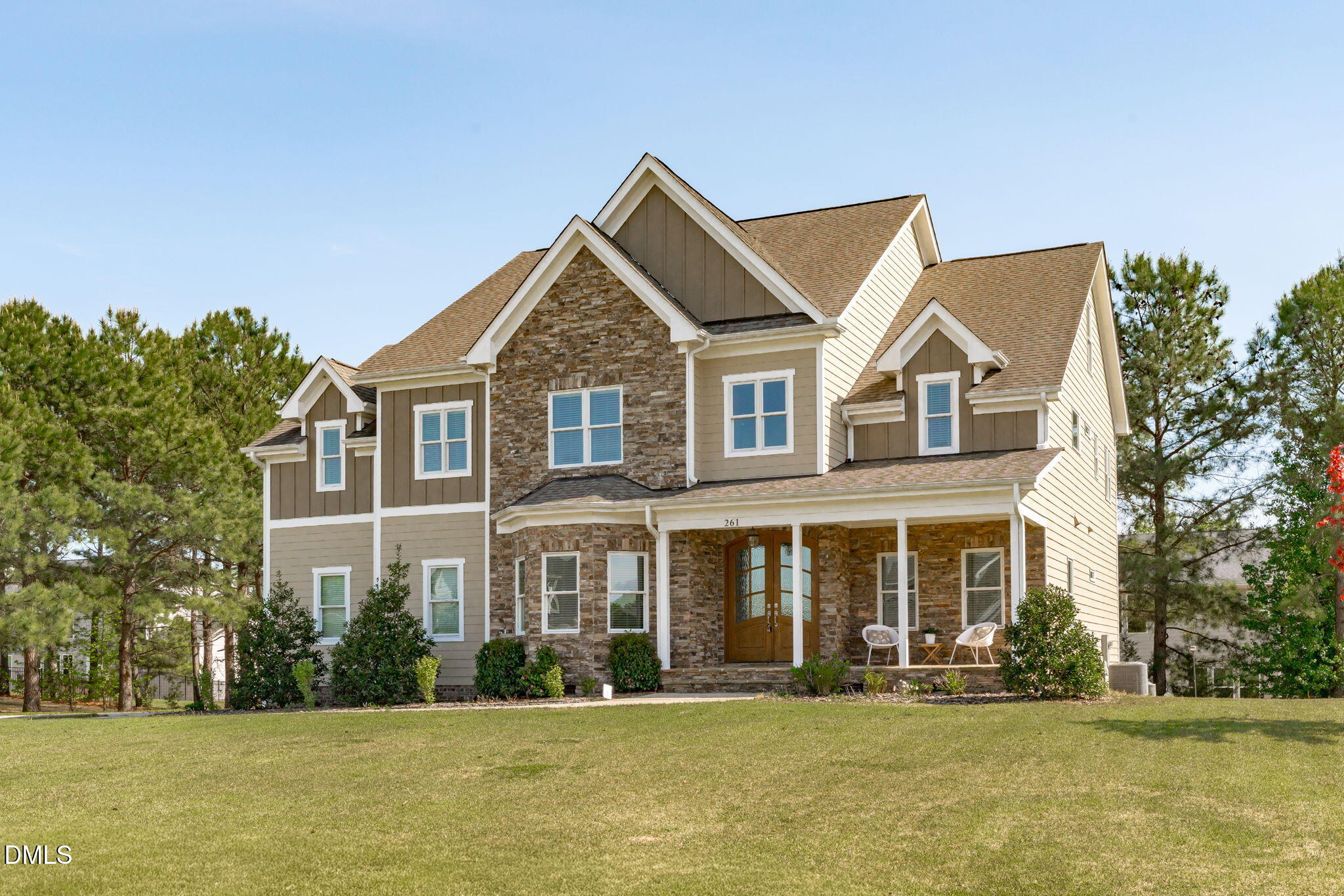261 Character Drive Rolesville, NC 27571 - Photo 7 of 61 a front view of a house with a yard