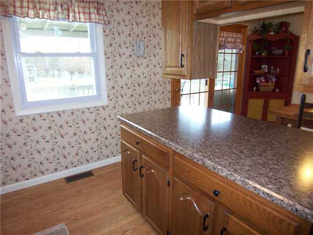 693 Yellow Mills Road Macedon, NY 14522 - Photo 12 of 16 Kitchen. Breakfast bar between the kitchen proper