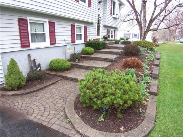 693 Yellow Mills Road Macedon, NY 14522 - Photo 5 of 16 Exterior Front. Check out the landscaped front wal