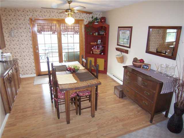 693 Yellow Mills Road Macedon, NY 14522 - Photo 10 of 16 Kitchen. Eat in section off the kitchen. Note the