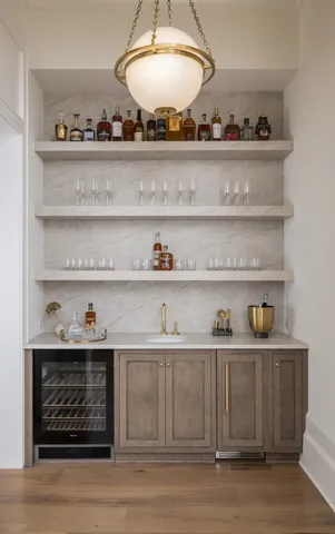 a kitchen with a cabinets and wooden floor