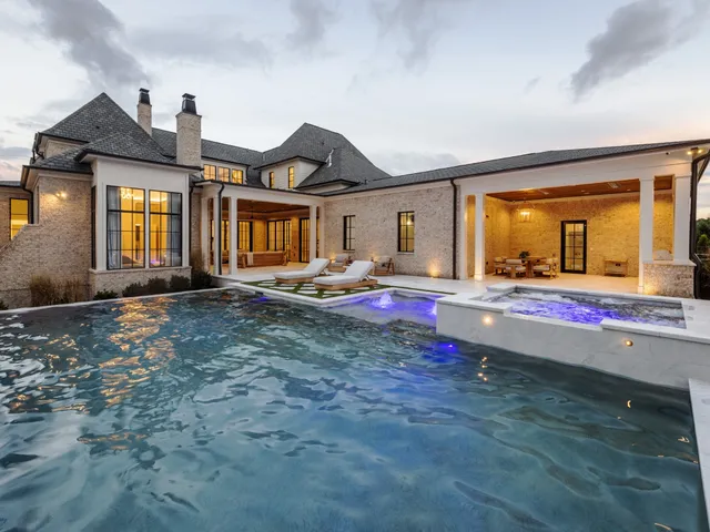 a living room with furniture rug and window