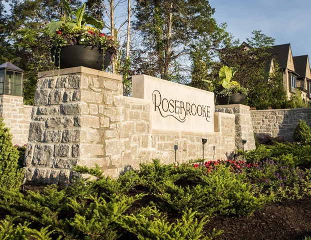 a view of a swimming pool with seating area