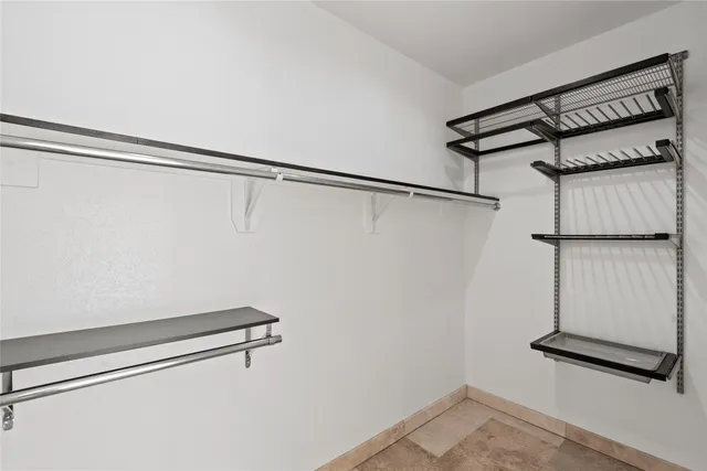 a view of a room with racks on the wall
