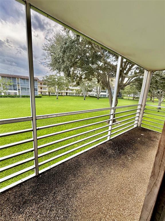 144 Mansfield D, Unit 144 Boca Raton, FL 33434 - Photo 17 of 37 a view of a green field